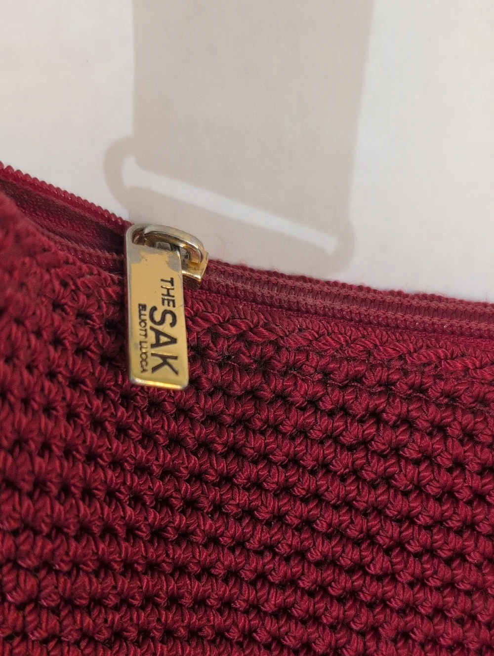 The Sak Women's Crochet Shoulder Bag in Crimson And Brown Faux Leather